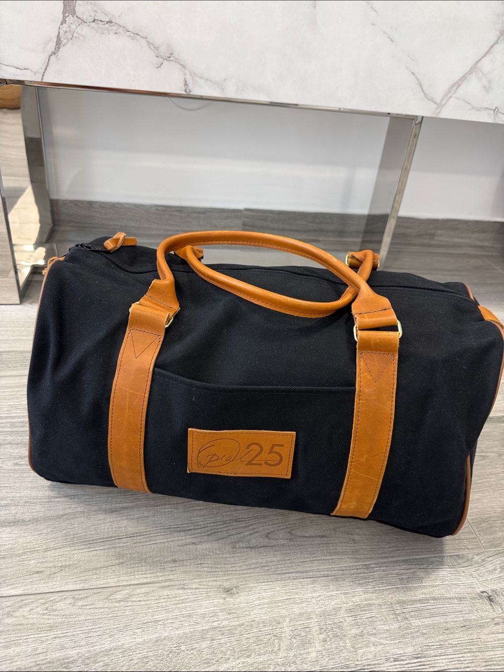 Classic Black Canvas Duffel with Tan Leather Trim
